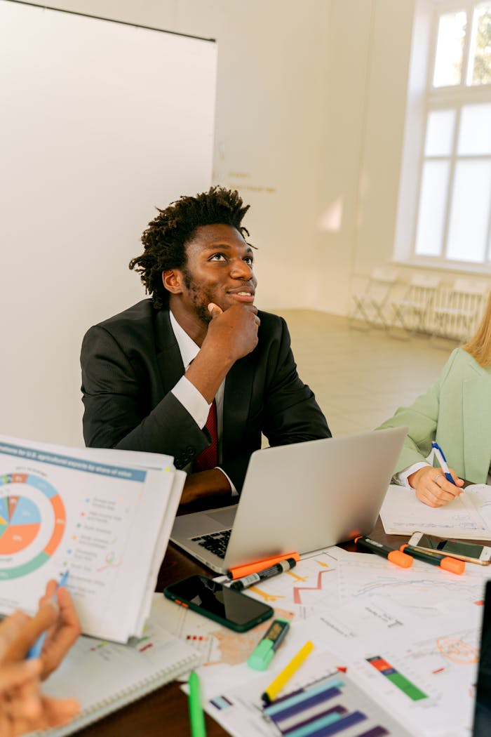 Business professional brainstorming in a modern office setting.